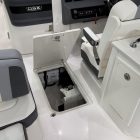 2025-chaparral-310-osx-cockpit-floor-storage